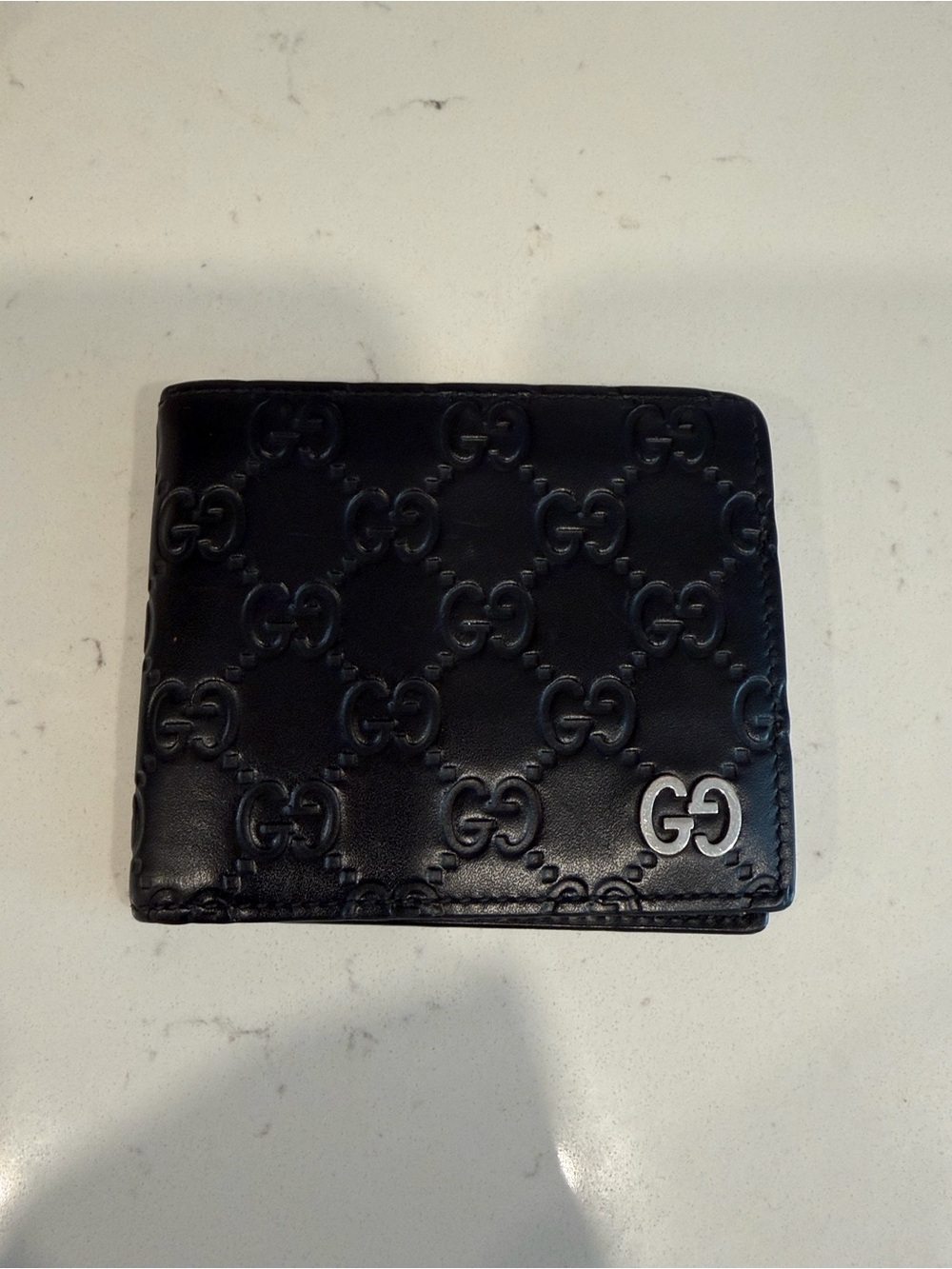 Gucci Black Embossed GG Leather Wallet with Silver-Tone Logo